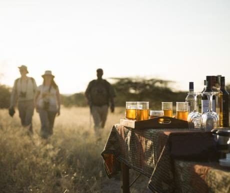 Sundowner drinks set out on the plains